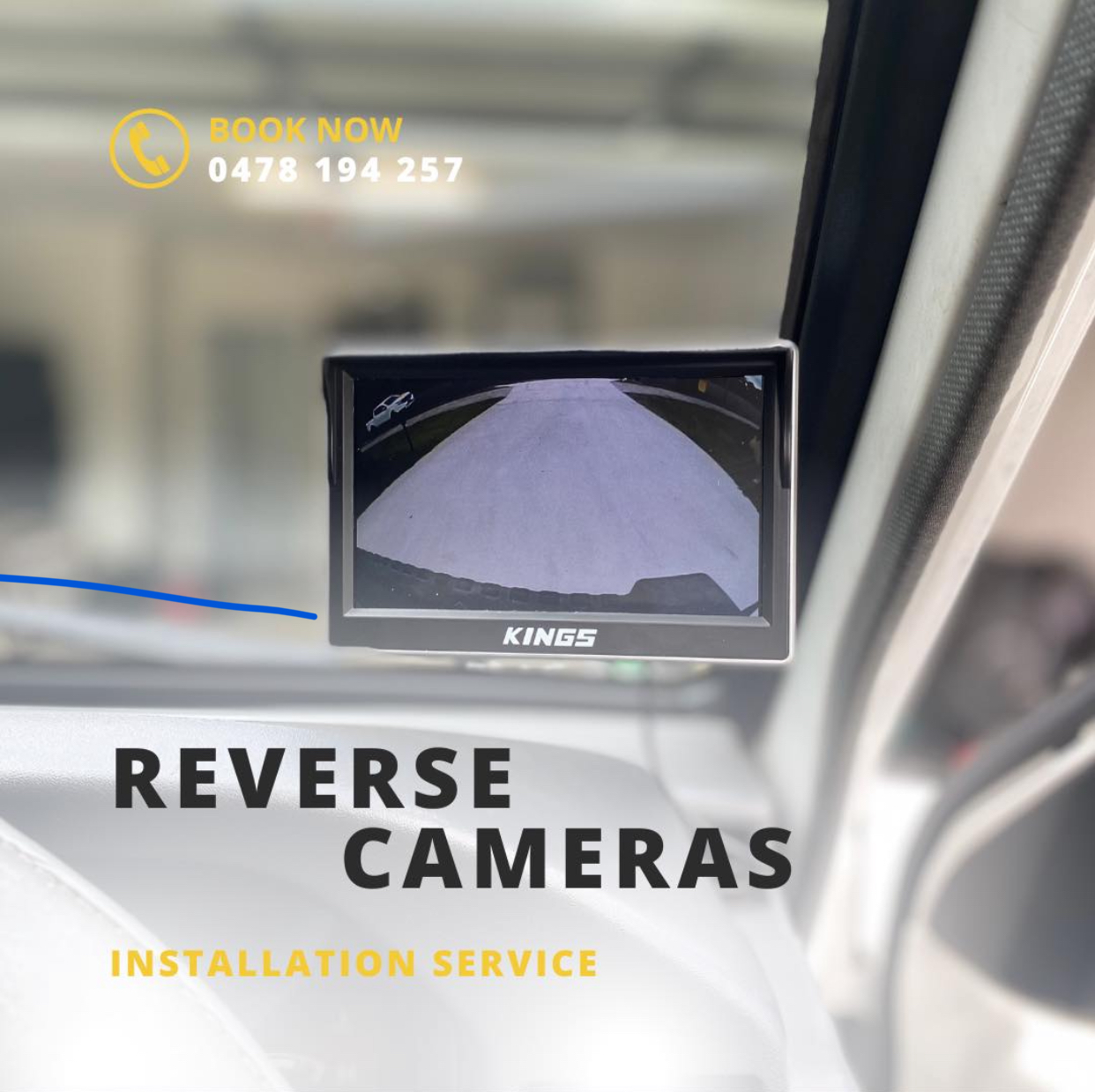 Reverse camera screen fitted to a windscreen, on the business's own reverse camera installation graphic